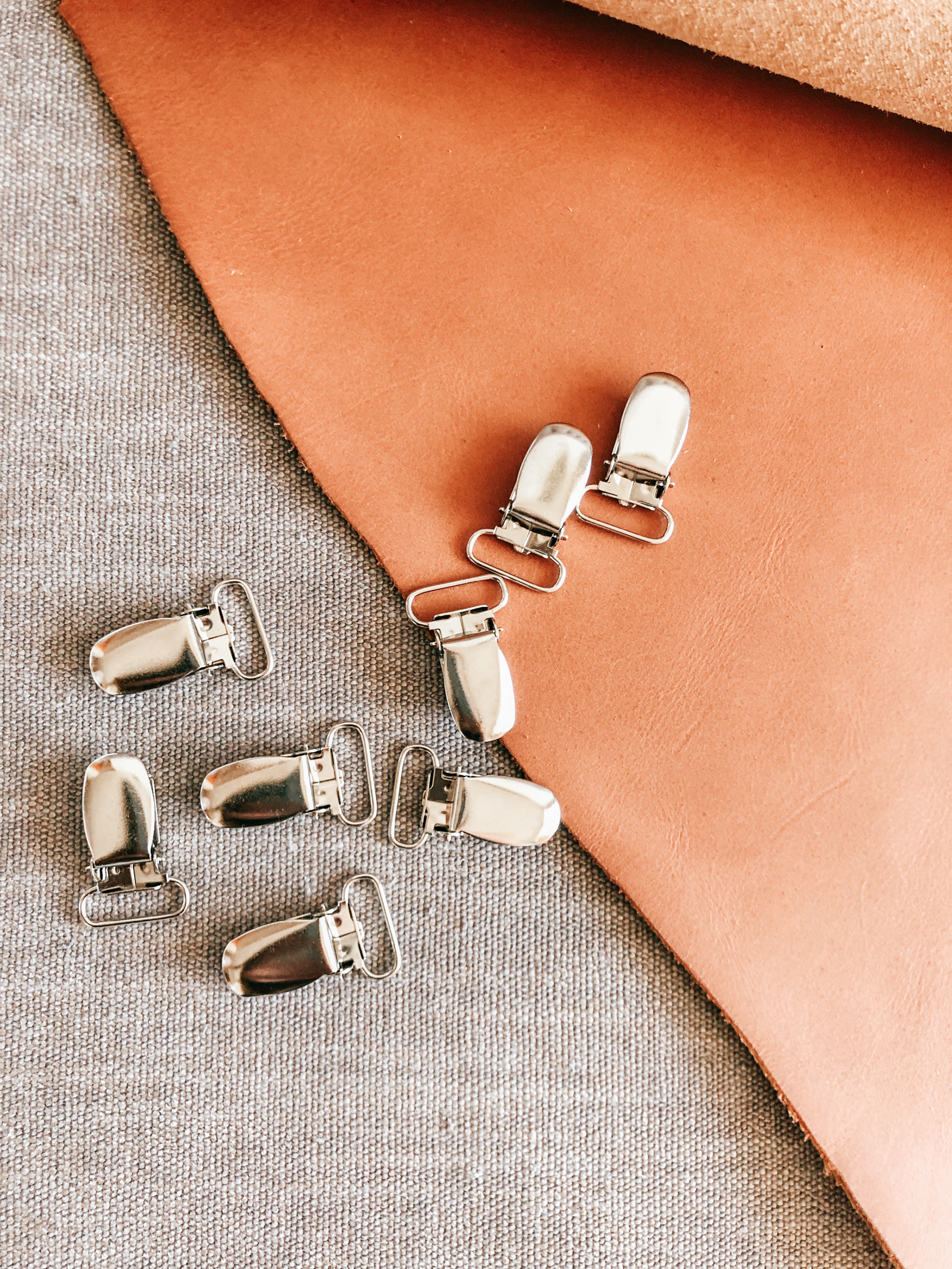 Welcome Set – Classic (Handmade Baby Booties + 3 Personalized Leather Pacifier Clips)